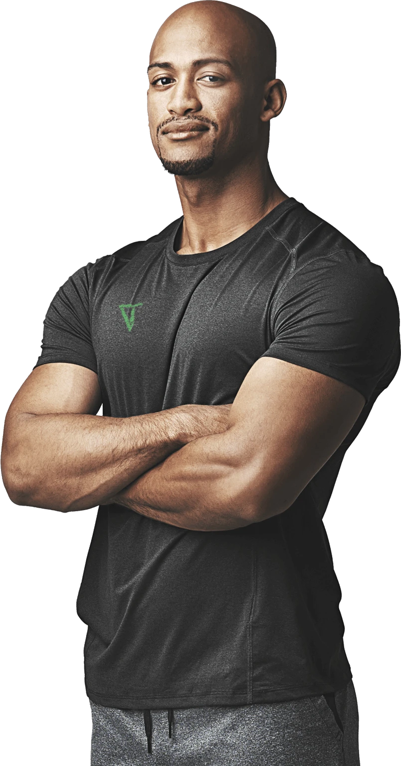 Personal trainer standing with arms crossed